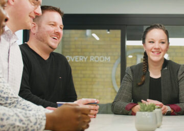 Picture of employees sitting together at workplace